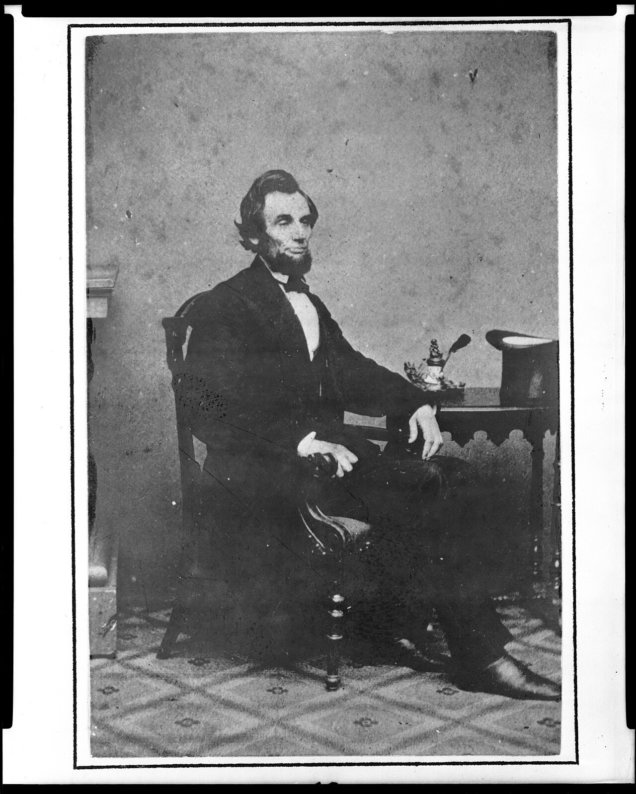 Full-length seated portrait of Abraham Lincoln, February 24, 1861